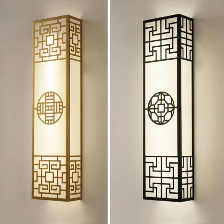 vemos dos apliques de estilo japonés, uno negro y otro dorado, sobre un fondo beige