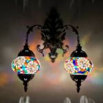 Aplique de mosaico oriental con dos cabezas